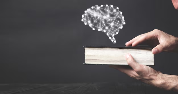Man holding a book with a human brain